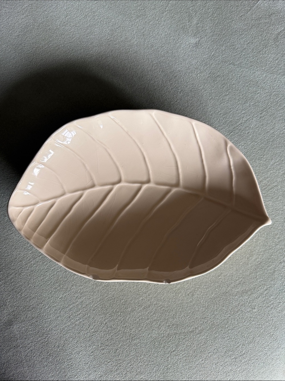 ceramic leaf-shaped serving tray is a Tiffany & Co. Catalpa leaf dish porcelain